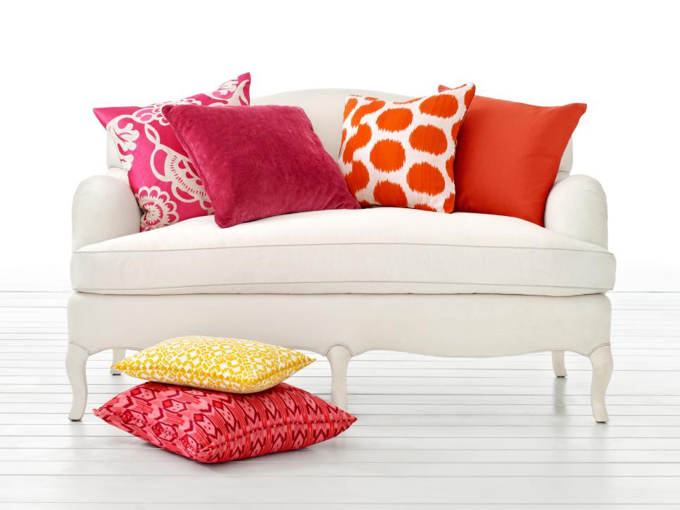 white sofa with colorful pillows