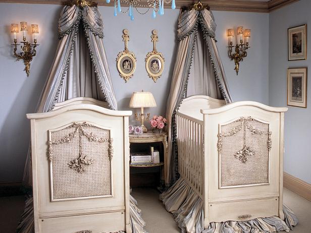 Blue Nursery With Ornate White Cribs And Crown Canopies Hgtv