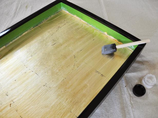 Adding Sealer to Black Serving Tray With Foam Brush
