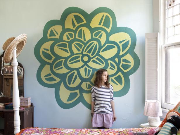 Green and Yellow Wall Painting in a Tween's Bedroom
