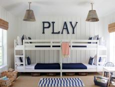 Cottage-Style Kids' Bedroom With Double Bunk Beds and Navy Accents