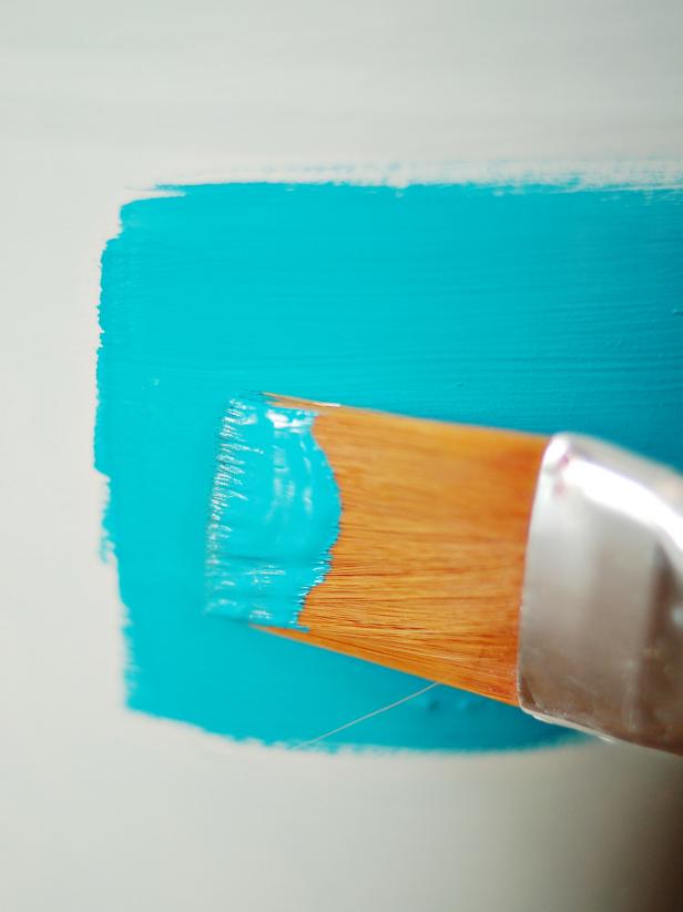 Spray primer onto pails and allow to dry. Apply acrylic paint with one-inch brush to each pail. Use long horizontal strokes to reduce brush marks. Apply second and third coats, if necessary, allowing ample dry time between coats.