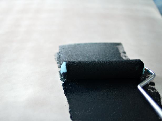 Applying Chalkboard Paint to White Surface With Foam Roller