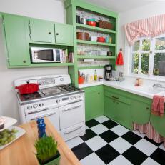 Vintage-Style Kitchen With Green Cabinets