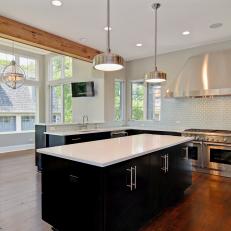 Neutral Contemporary Open Plan Kitchen With Black and White Island