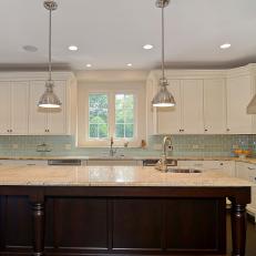 Kitchen With Pale Blue Glass Tile Backsplash 