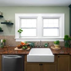 Green Kitchen With White Farmhouse Sink