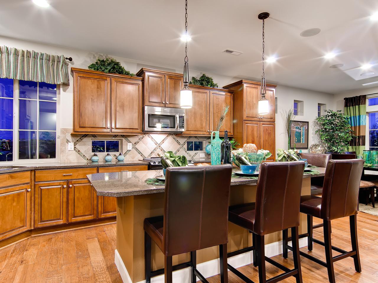  Traditional  Kitchen  Island With Brown Leather Barstools HGTV