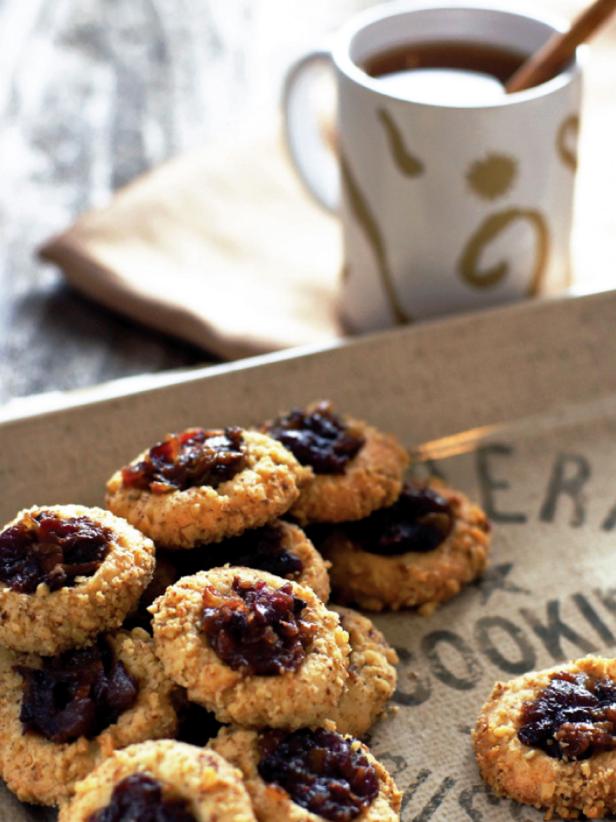 Cup of Tea and Stacked Cookies With Filling 