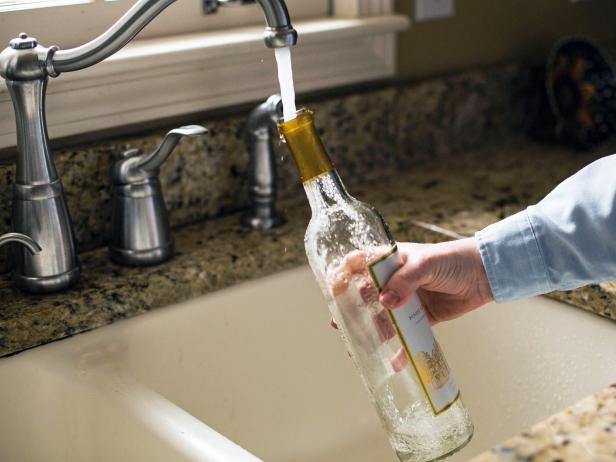 Glass Wine Bottle Washed in Kitchen Sink