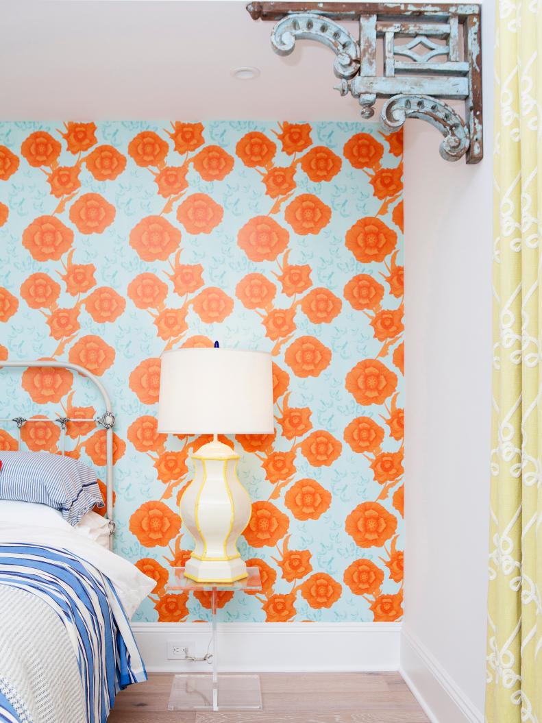 Eclectic Guest Bedroom With Orange And Blue Floral Wallpaper