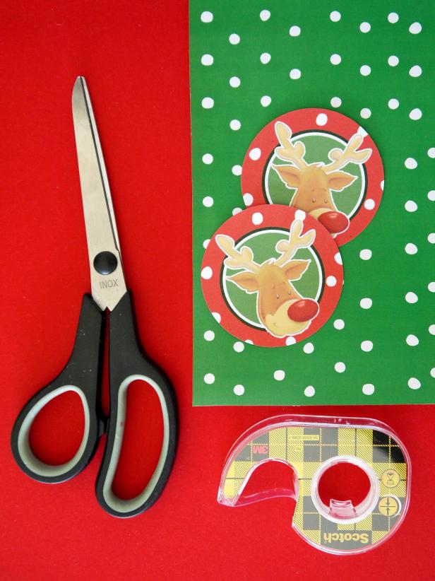 Scissors, tape, craft paper and printed tags