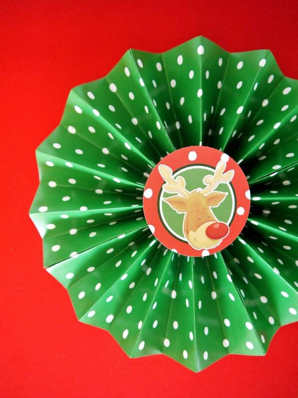 Folded paper Christmas rosette decoration