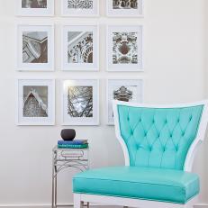 Master Bedroom Sitting Area With a Gallery Wall and Turquoise Chair