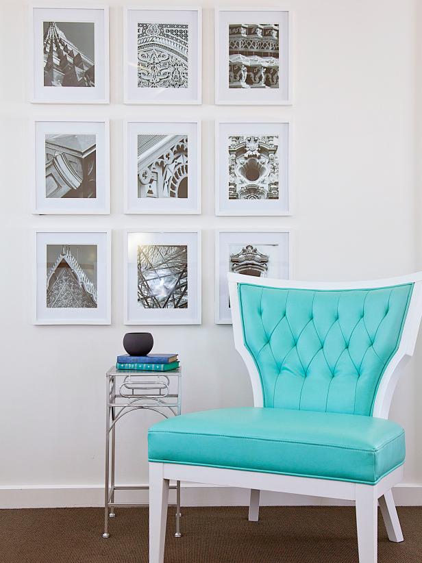 Master Bedroom Sitting Area With a Gallery Wall and Turquoise Chair