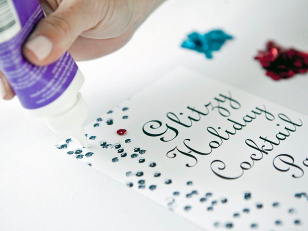 Place dots of tacky glue on the paper where you want to glue individual sequins. Tip: Random patterns look best.