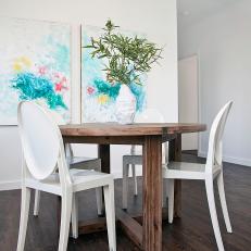 Turquoise Artwork in White Dining Room