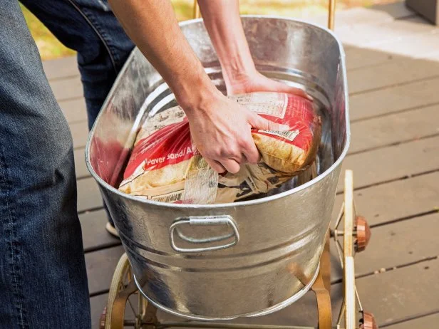 Bag of Sand Inside Galvanized Metal Wash Tub