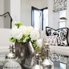 White Living Room With Black and Silver Accents