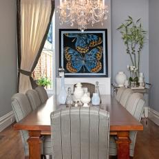 Transitional Gray Dining Room With Butterfly Art
