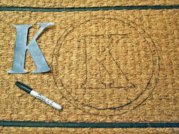 Letter K on Doormat With Permanent Marker