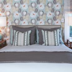 Gray Bedroom With Floral Wallpapered Accent Wall