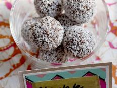 Coconut dipped chocolate truffles in bowl