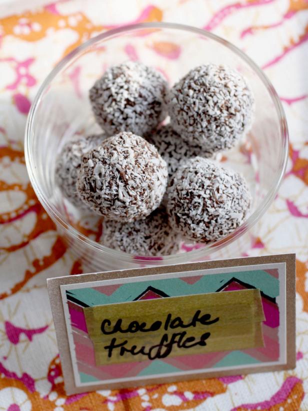 Coconut dipped chocolate truffles in bowl