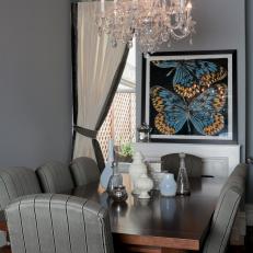 Gray Dining Room With Crystal Chandelier