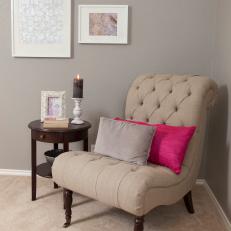 Gray Bedroom Sitting Area With Tufted Chair