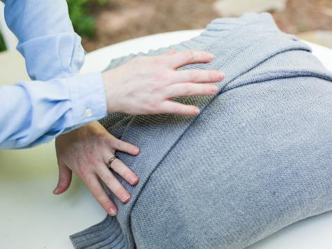 Turn an Old Sweater Into a Chic, Preppy Pillow