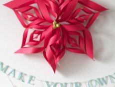 Homemade Paper Snowflake Hanging in Home