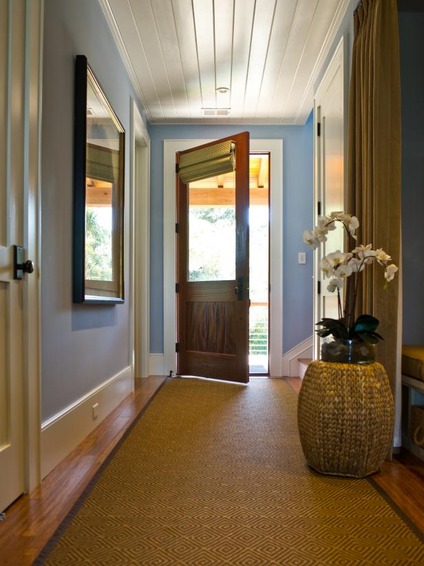 Traditional Blue Entry With Brown Wood Front Door