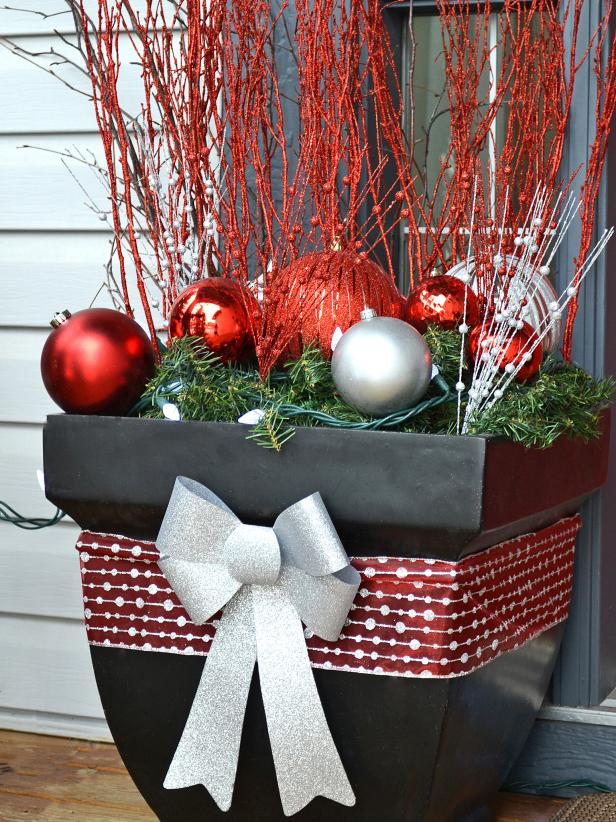 Flower Pot With Red and Silver Ornaments, Garland and Twigs