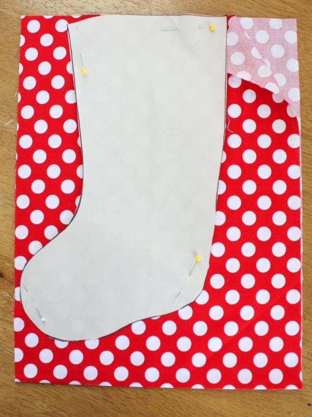 Stocking Template Pinned to Red and White Polka Dot Fabric