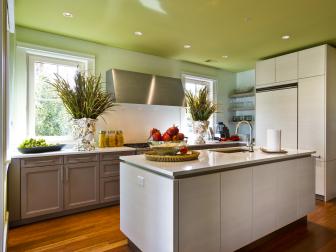 Soft Green Kitchen With Modern Island
