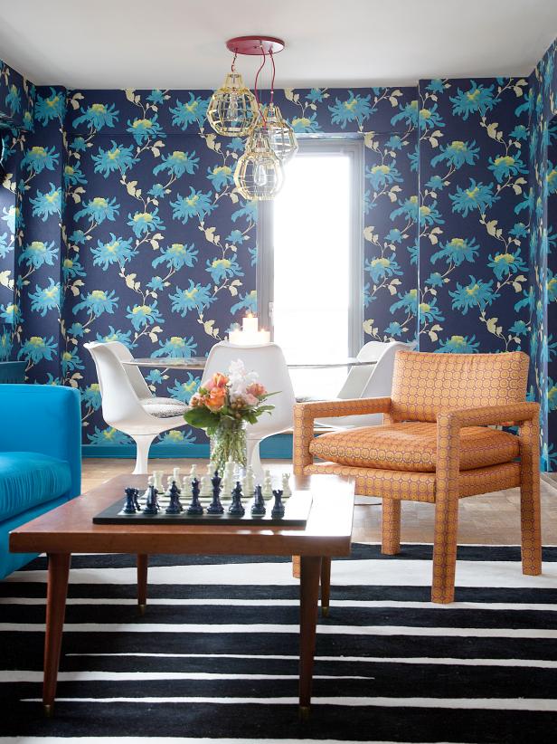 Sitting Room With Blue Wallpaper, Wire Pendant Lighting & Tulip Chairs