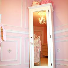 Pink Nursery With Mirrored White Armoire