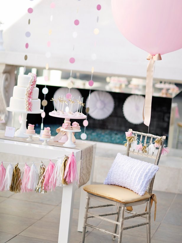 Cake Table With Tassel Garland, Pink Balloon, Gold Chair