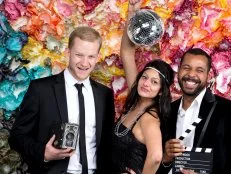 Photo Booth Snapshot of Woman and Two Men