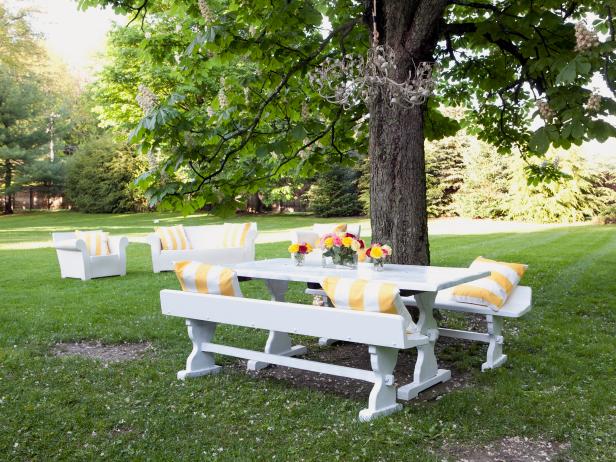 Contemporary Outdoor Dining Area With White Picnic Table