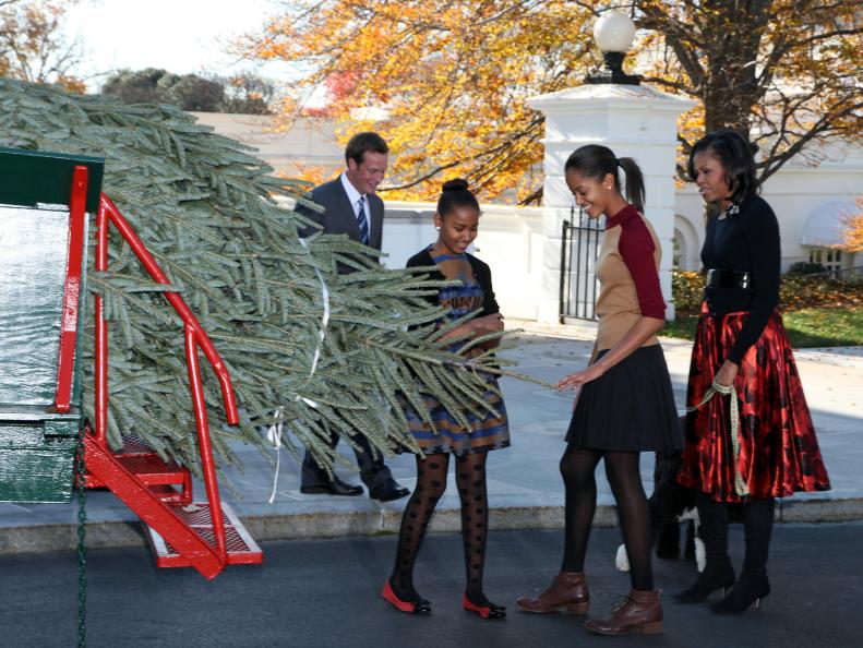 White House Family Looks at Christmas Tree 