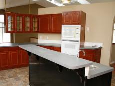 Neutral Open-Plan Kitchen With Black and Gray DIY Island