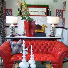 Eclectic Living Room With Vintage Red Leather Couch