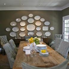 Neutral Country Dining Room With Wood Table and Plate Wall Art