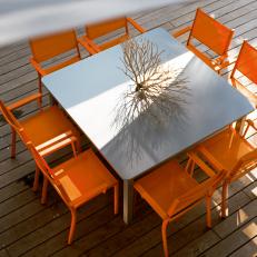 Photos Hgtv Outdoor Dining Table With Brilliant Orange Chairs