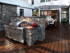 Rustic Deck with Grill and Outdoor Dining Area
