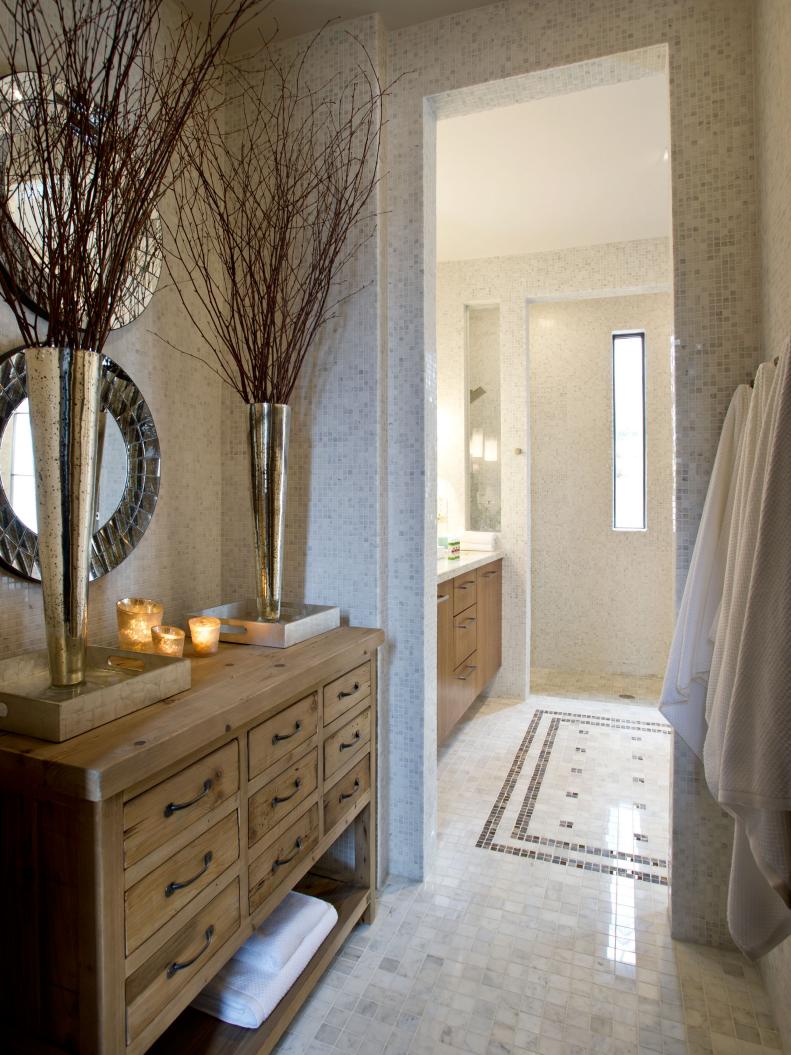 Bathroom With White Tile Walls, Floors and Rustic Wood Chest