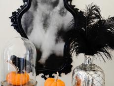 Mirror, Pumpkins and Vase with Black Feathers