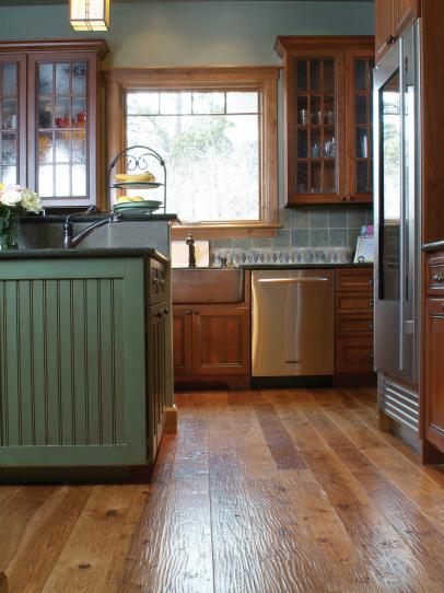Reclaimed Hardwood Flooring Diy, Do You Put Hardwood Floors Under Kitchen Cabinets